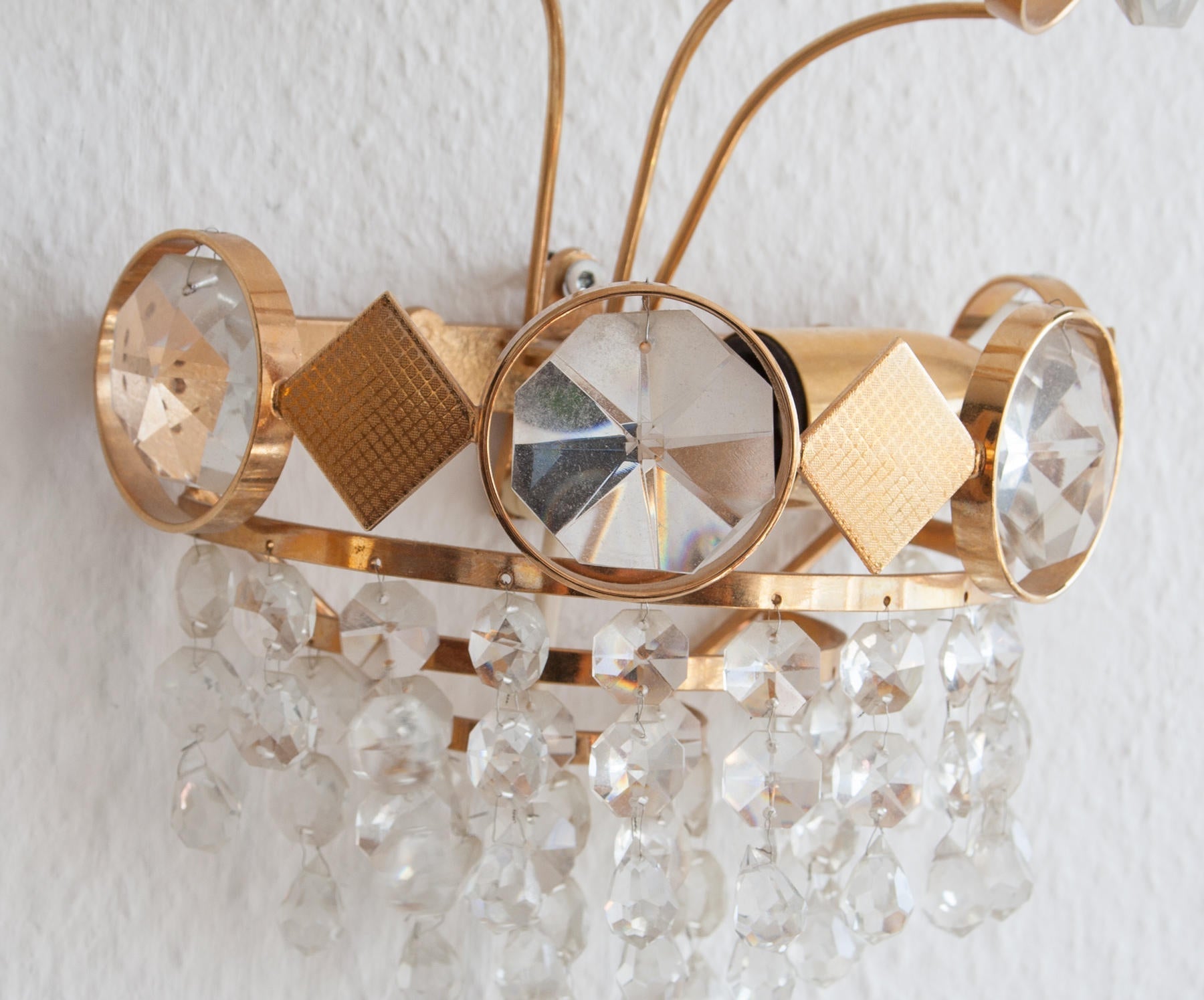 A Pair of Gold-Plated Brass Wall Sconces with Cut Crystal Prisms Mollaris.com 