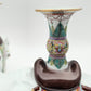 A PAIR OF CHINESE FAMILLE ROSE ELEPHANT-FORM JOSS STICK HOLDERS | REPUBLIC PERIOD, 20TH CENTURY