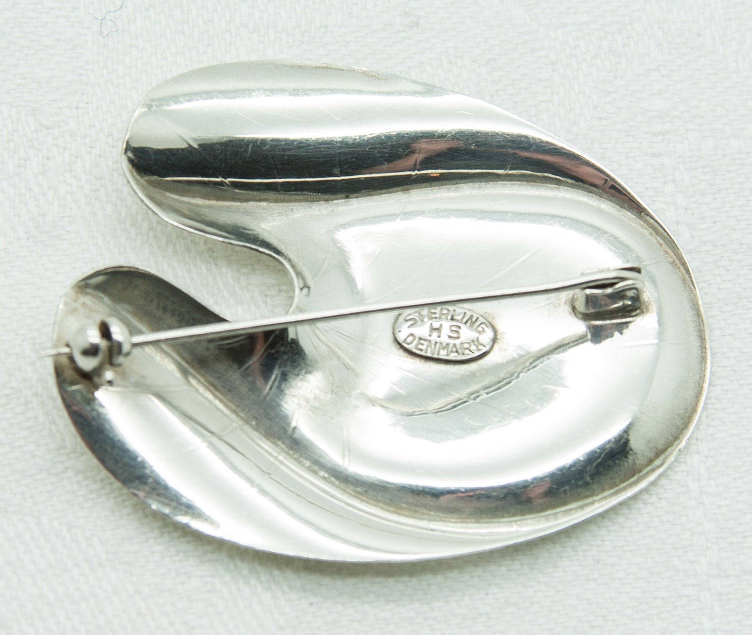 Sale A silver brooch by Herman Siersbol